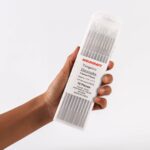 Hand holding of ten Weldcraft 1.6mm (1/16 inch) white (WZ8) 0.8% zirconiated tungsten electrodes TIG welding