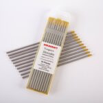 Close-up of a 10-pack of Weldcraft 4.0mm (5/32 inch) gold pure tungsten electrodes for TIG welding, ground finish, on a gold background.